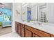 Toy Story themed bathroom with double sinks at 1808 Sandy Park Trl, Kissimmee, FL 34747