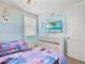 Bedroom with Frozen-themed decor and a TV at 1808 Sandy Park Trl, Kissimmee, FL 34747