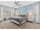 Main bedroom with canopy bed and ocean-themed wall at 1808 Sandy Park Trl, Kissimmee, FL 34747