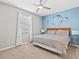 Bedroom with king-size bed and ceiling fan at 1808 Sandy Park Trl, Kissimmee, FL 34747