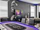 Game room with poker table and Star Wars decor at 1808 Sandy Park Trl, Kissimmee, FL 34747
