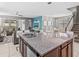 Island kitchen with granite countertops and double sinks at 1808 Sandy Park Trl, Kissimmee, FL 34747