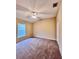 Spacious bedroom featuring a ceiling fan and carpet at 209 Wekiva Pointe Cir, Apopka, FL 32712