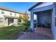 Small backyard with grassy area and patio at 2229 Shadowland Loop, Winter Park, FL 32792