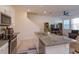 Open concept kitchen with granite island, stainless steel appliances and breakfast bar at 2229 Shadowland Loop, Winter Park, FL 32792
