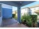 Private patio with brick pavement and surrounding plants at 2229 Shadowland Loop, Winter Park, FL 32792