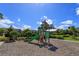 playground with slide and climbing structure at 2229 Shadowland Loop, Winter Park, FL 32792