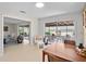 Open dining area with easy access to outdoor screened lanai and comfortable seating space at 2459 Hunterfield Rd, Maitland, FL 32751