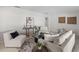 Bright living room with modern decor, cozy seating, and stylish accents at 2459 Hunterfield Rd, Maitland, FL 32751