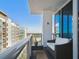 Relax on this condo balcony offering a comfortable seat and city views at 260 S Osceola Ave # 1001, Orlando, FL 32801
