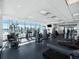 Bright gym with fitness equipment, large windows and rubber flooring at 260 S Osceola Ave # 1001, Orlando, FL 32801