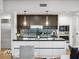 Modern kitchen boasts sleek countertops, modern appliances, and a functional island for an enjoyable cooking space at 260 S Osceola Ave # 1001, Orlando, FL 32801