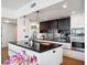 Well-equipped kitchen with a central island, modern appliances, and sleek finishes for seamless cooking experience at 260 S Osceola Ave # 1001, Orlando, FL 32801