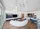 Open-concept living area with modern decor and hardwood floors at 260 S Osceola Ave # 1001, Orlando, FL 32801