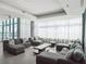 Community lounge area with lots of comfy seating and access to the outdoor pool at 260 S Osceola Ave # 1001, Orlando, FL 32801