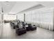 Bright lounge area with ample seating, neutral decor, and large windows creating a relaxing ambiance at 260 S Osceola Ave # 1001, Orlando, FL 32801