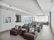 Upscale community lounge featuring comfortable gray seating and bar area at 260 S Osceola Ave # 1001, Orlando, FL 32801