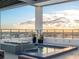 Rooftop pool spa with mosaic tile, city views, and inviting ambiance at 260 S Osceola Ave # 1001, Orlando, FL 32801