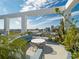 Inviting rooftop deck with lush greenery, a cozy seating area, and panoramic city views at 260 S Osceola Ave # 1001, Orlando, FL 32801