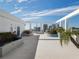 Expansive rooftop deck with skyline views, lounge areas, landscaping, and ample space for entertaining at 260 S Osceola Ave # 1001, Orlando, FL 32801