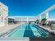 Amazing rooftop pool with clear views, lounge seating, and access to indoor lounging areas at 260 S Osceola Ave # 1001, Orlando, FL 32801