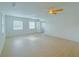 Bright bedroom with window and ceiling fan at 2827 Sanctuary Ln, Winter Garden, FL 34787
