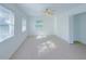 Spacious bedroom with light flooring and ceiling fan at 2827 Sanctuary Ln, Winter Garden, FL 34787