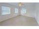 Bright bedroom with light wood flooring and ceiling fan at 2827 Sanctuary Ln, Winter Garden, FL 34787