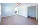 Bright bedroom with wood-look floors and ceiling fan at 2827 Sanctuary Ln, Winter Garden, FL 34787