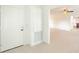 Bright entryway with white door and view to living room at 2827 Sanctuary Ln, Winter Garden, FL 34787
