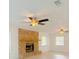 Brick fireplace with a wooden mantel in the living room at 2827 Sanctuary Ln, Winter Garden, FL 34787
