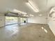 Large garage with double doors and high ceilings at 2827 Sanctuary Ln, Winter Garden, FL 34787