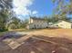 Two-story house with a large backyard and detached garage at 2827 Sanctuary Ln, Winter Garden, FL 34787