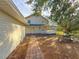 Brick pathway leads to two-story house with a porch at 2827 Sanctuary Ln, Winter Garden, FL 34787