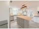 Modern kitchen features a butcher block island and stainless steel appliances at 2827 Sanctuary Ln, Winter Garden, FL 34787