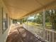 Long porch overlooking a large backyard at 2827 Sanctuary Ln, Winter Garden, FL 34787