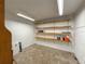 Storage room with built in shelving at 2827 Sanctuary Ln, Winter Garden, FL 34787