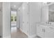 Bright bathroom with double vanity, separate soaking tub and shower, and neutral color palette at 2983 Arranmore Dr, Ormond Beach, FL 32174