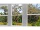 New construction home featuring view from windows of mature trees and Florida landscape at 2983 Arranmore Dr, Ormond Beach, FL 32174