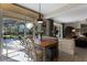 Kitchen breakfast nook with sliding glass doors to the pool at 3791 Brantley Place Cir, Apopka, FL 32703