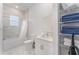 Clean bathroom with a tub, shower, and modern vanity at 388 Famagusta Dr, Davenport, FL 33896