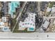 Overhead view of building, pool, parking and beach access at 421 S Atlantic Ave # 105, New Smyrna Beach, FL 32169