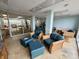 Relaxing community lounge with wicker seating at 421 S Atlantic Ave # 105, New Smyrna Beach, FL 32169