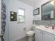 Updated bathroom with gray tile backsplash and white vanity at 507 Applewood Ave, Altamonte Springs, FL 32714