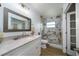 Clean bathroom, featuring a granite vanity and marble shower at 507 Applewood Ave, Altamonte Springs, FL 32714