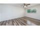 Bright bedroom with new laminate flooring and ceiling fan at 507 Applewood Ave, Altamonte Springs, FL 32714