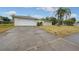 House with a long driveway and mature trees at 507 Applewood Ave, Altamonte Springs, FL 32714
