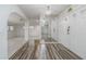 Bright and airy entryway with wood flooring and a large mirror at 507 Applewood Ave, Altamonte Springs, FL 32714