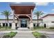 Inviting entrance to a modern building with a covered walkway at 507 Applewood Ave, Altamonte Springs, FL 32714