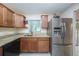 Modern kitchen features granite countertops and stainless steel appliances at 507 Applewood Ave, Altamonte Springs, FL 32714